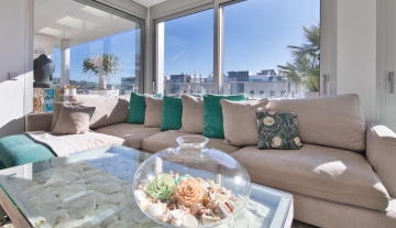 Resa Estates Ibiza te koop penthouse Marina botafoch for sale Ibiza salon sofa.jpeg